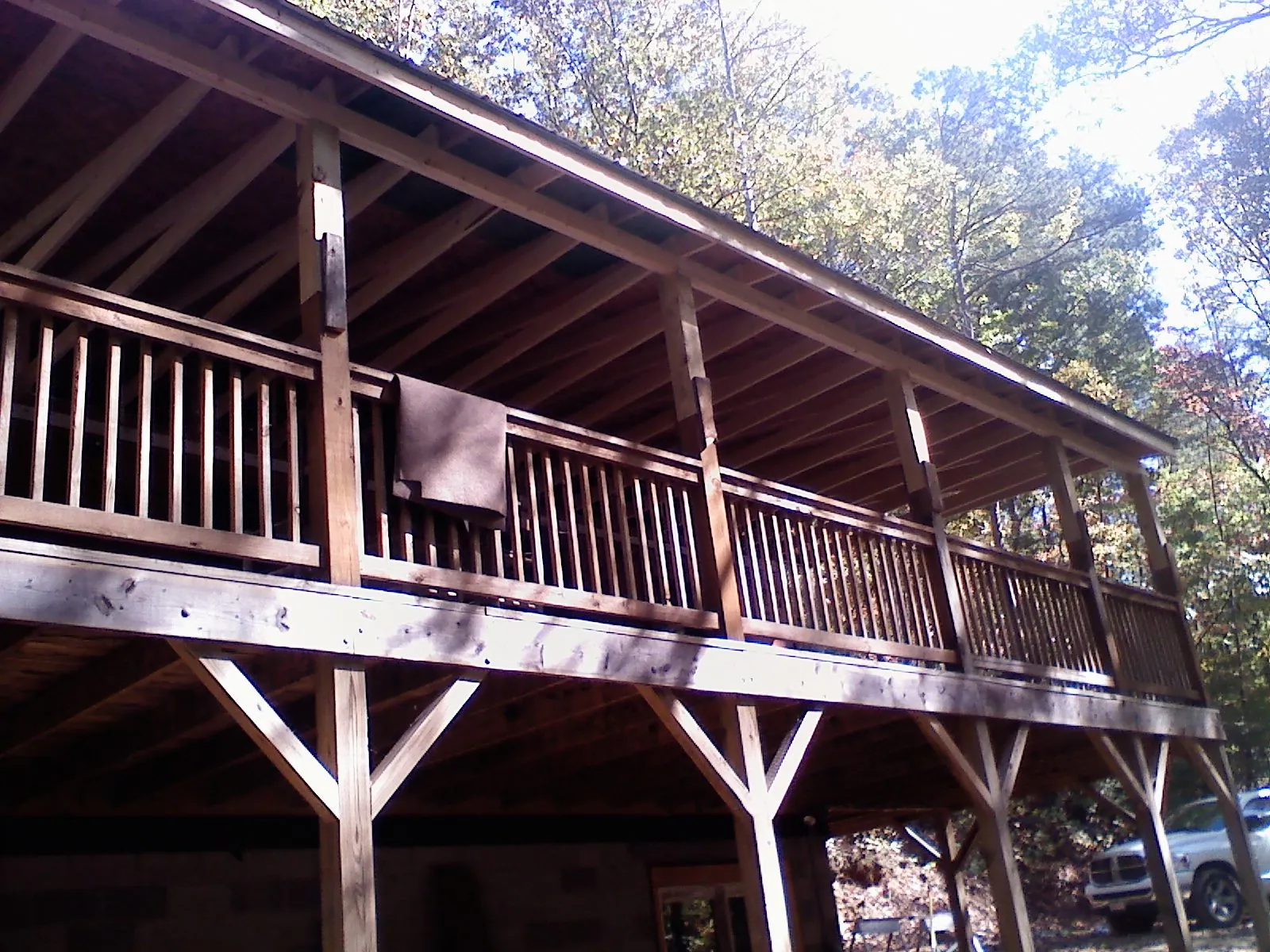Timber framing under a new elevated porch and deck — Roof Leak Repair in Charlotte Court House by Roofing Brothers